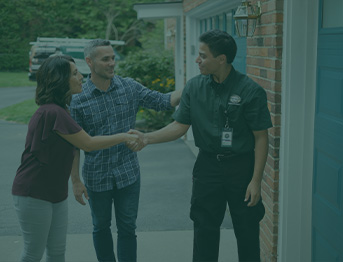 Techs Leaning on Van